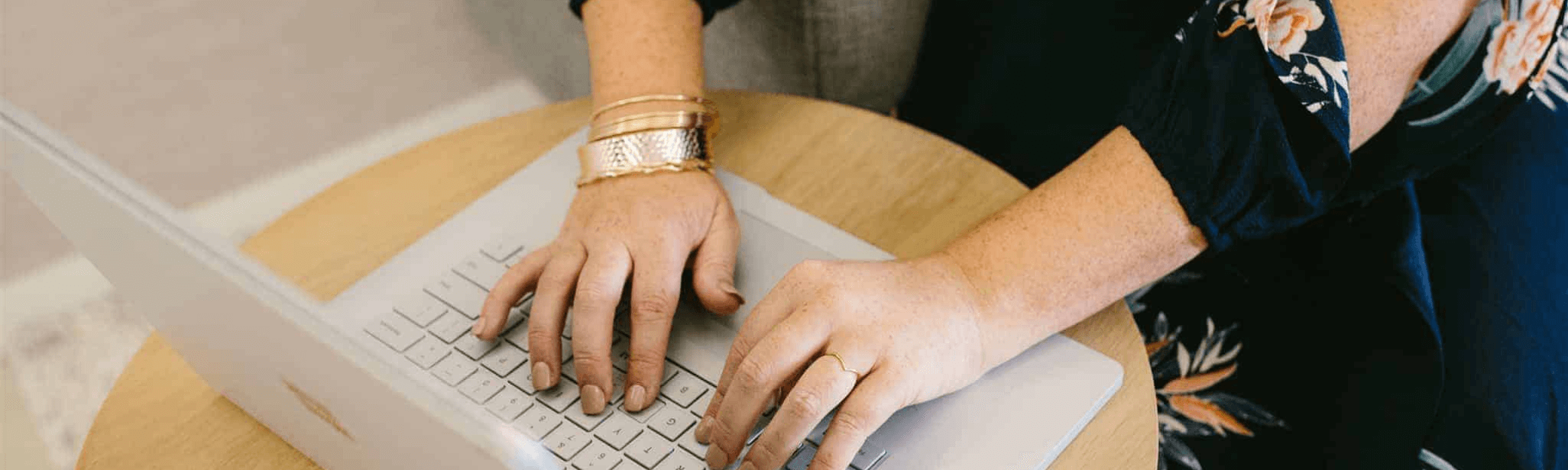 Nikki Hamilton typing on a laptop